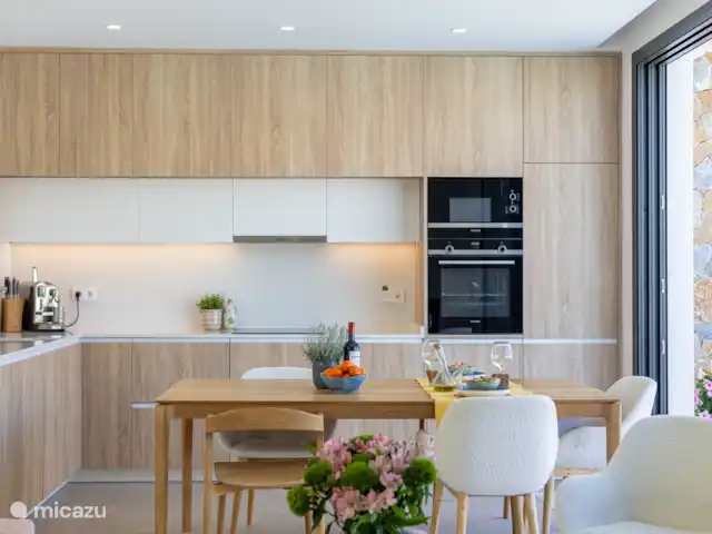 Location de Vacances Espagne, Murcia, Santiago de la Ribera, appartement - Villa a gustito  La cuisine et la table à manger