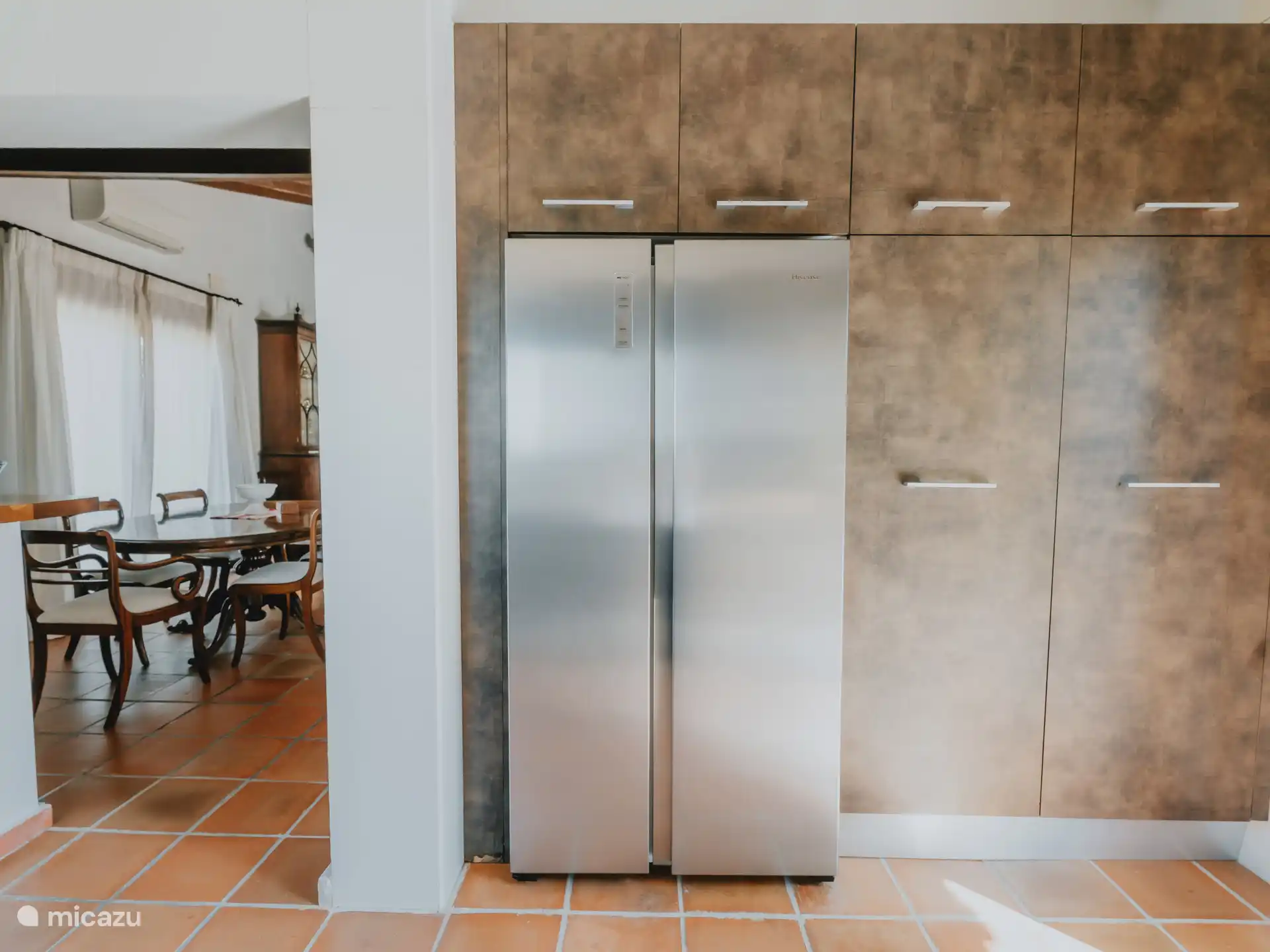 Casa Carolina - Cocina semiabierta con acceso al comedor. 