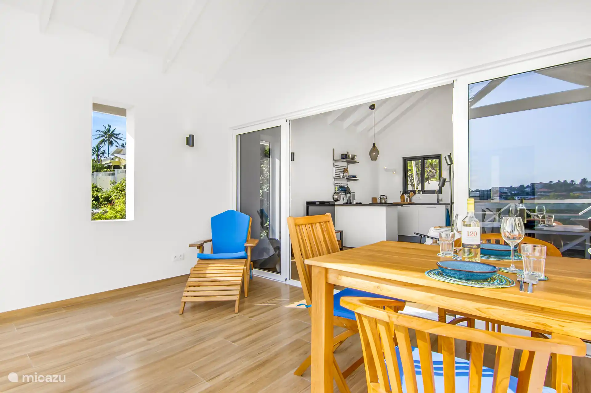 Terrace with dining table and relax chair
