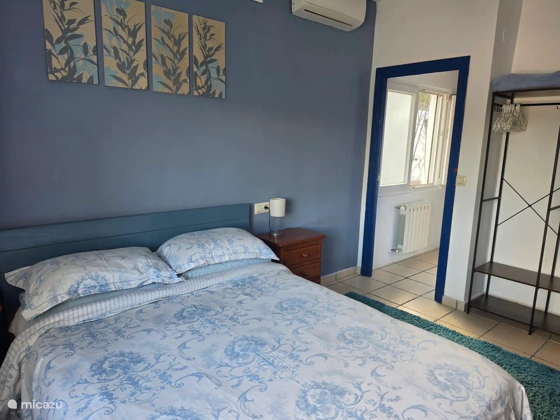 Dormitorio principal con baño en suite