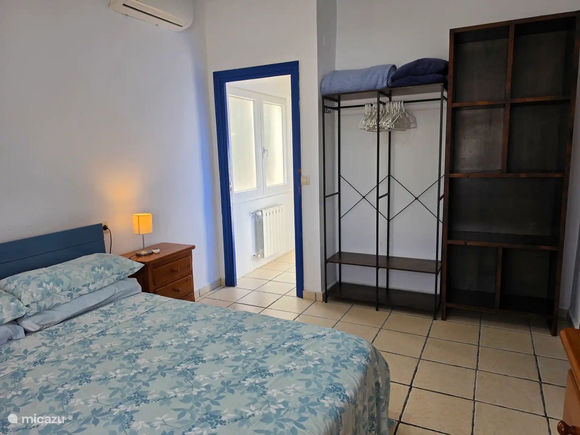 Dormitorio principal con baño en suite