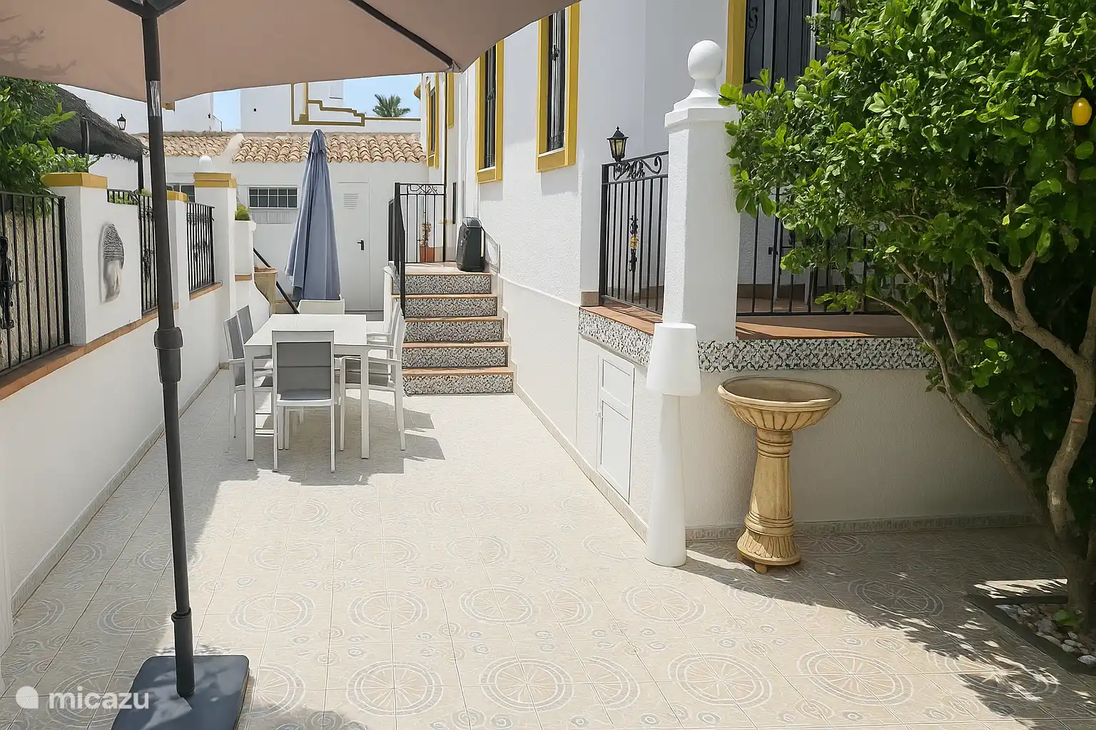 Side with outdoor dining area 