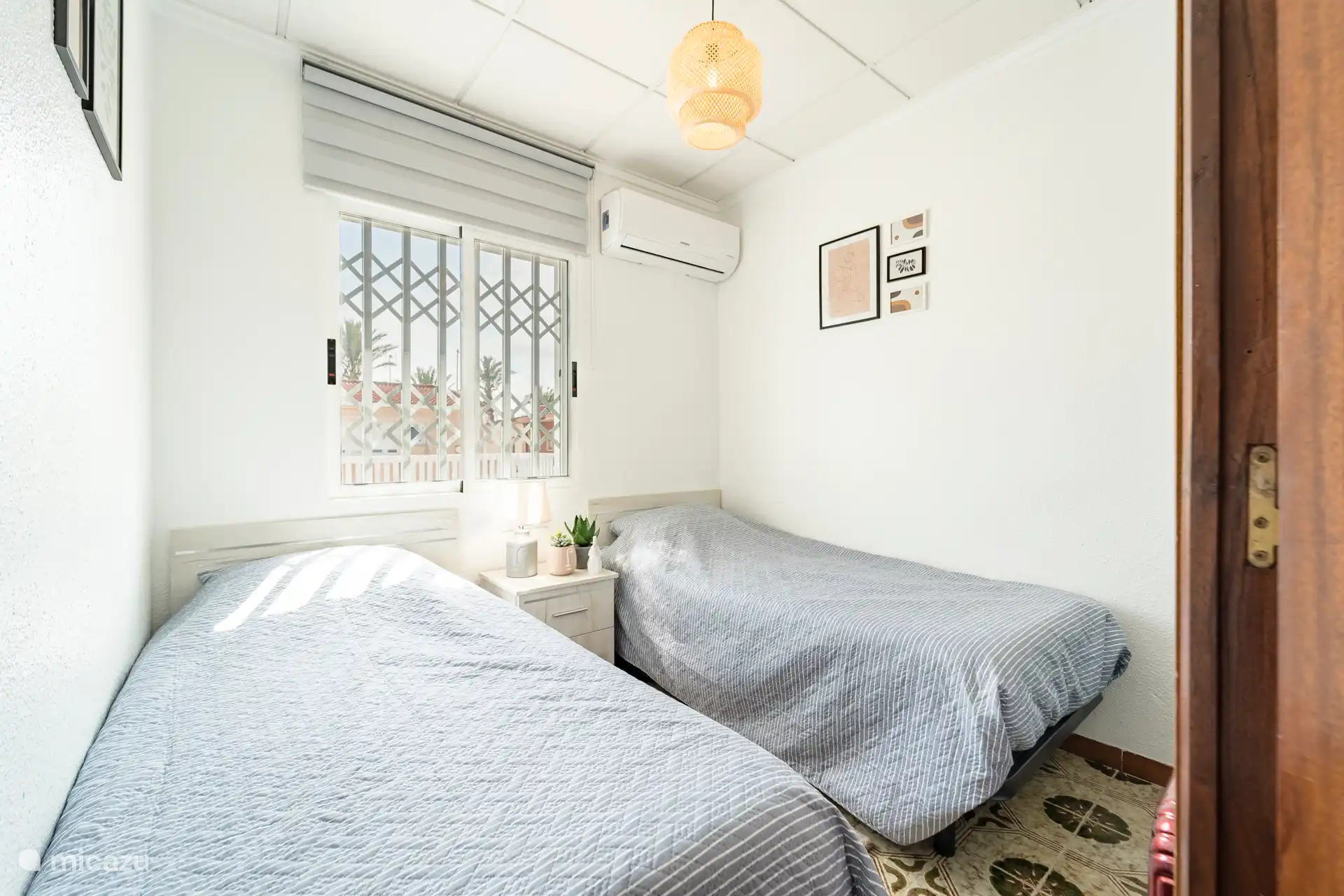 Bedroom 1st floor, including air conditioning and built-in wardrobe