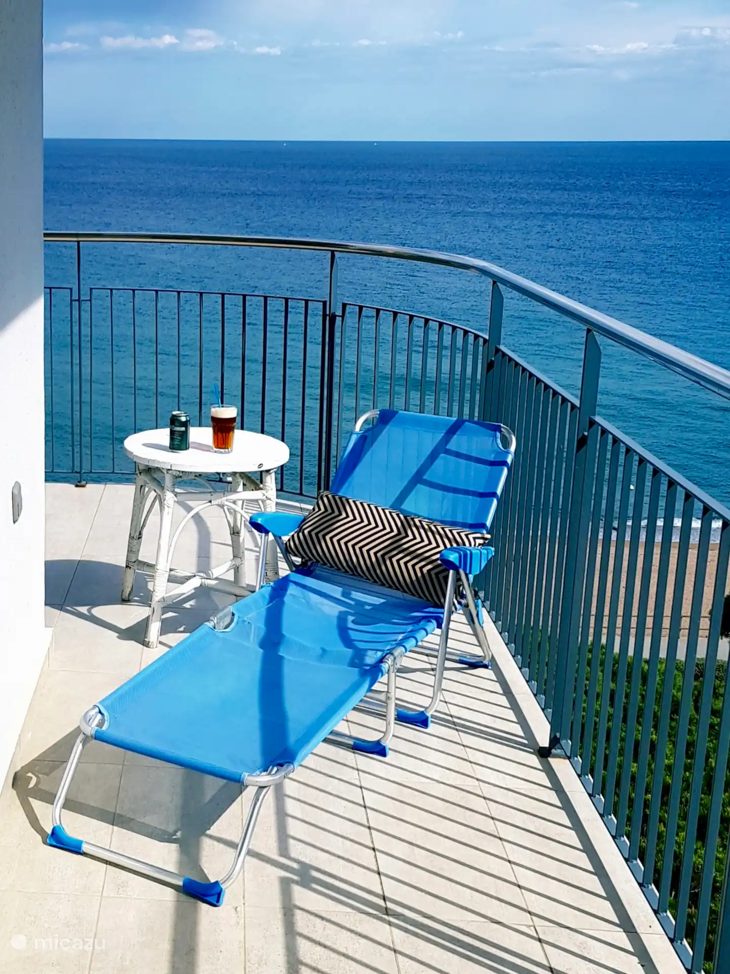 Sunbathing on the balcony.