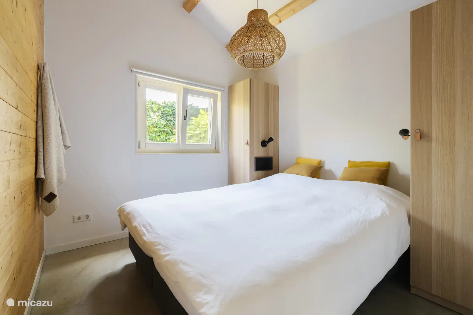 The spacious master bedroom