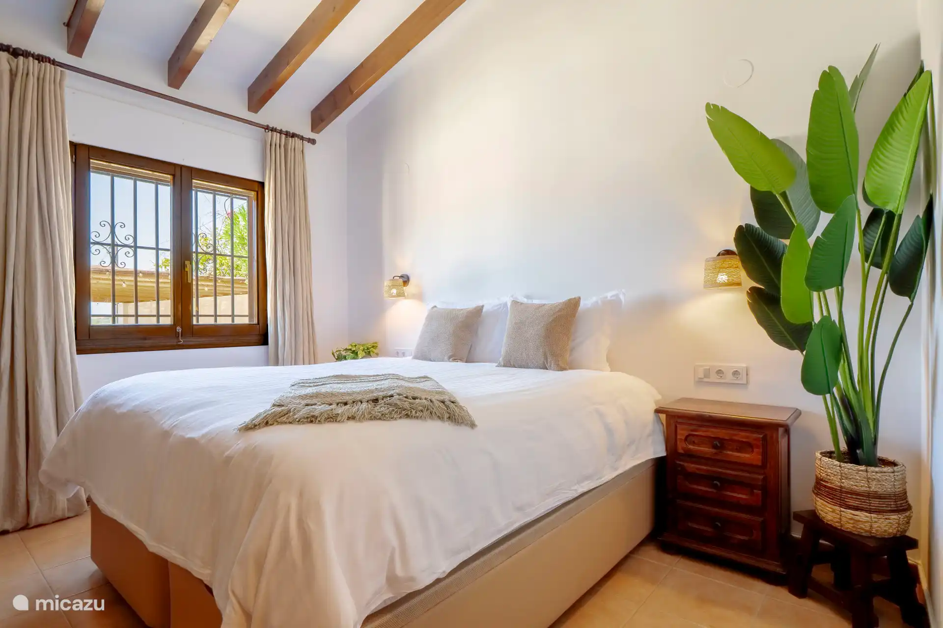 The master bedroom with adjoining bathroom.