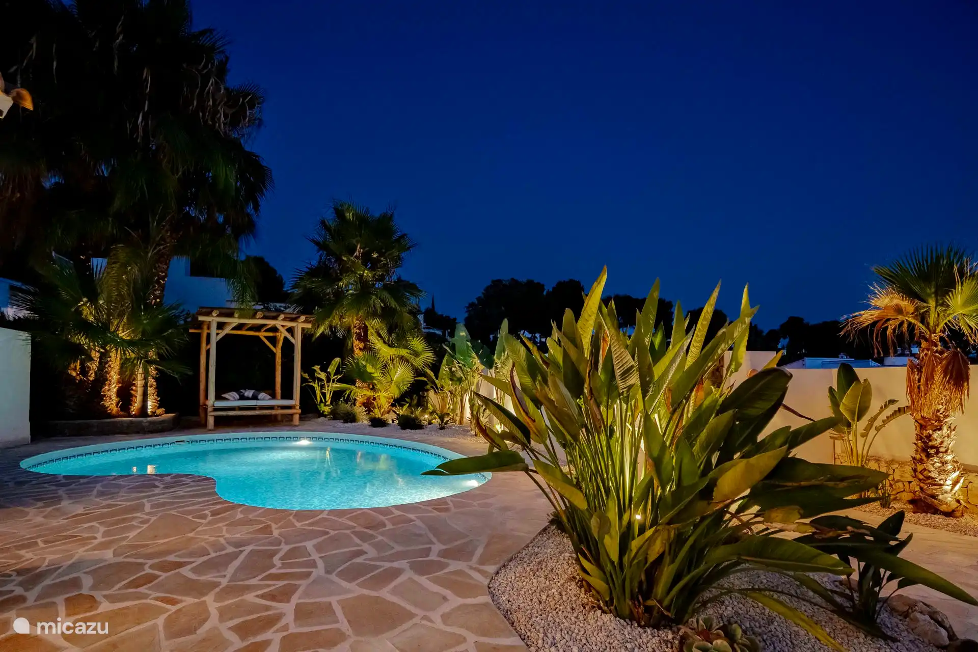 Enjoy the beautifully lit garden.