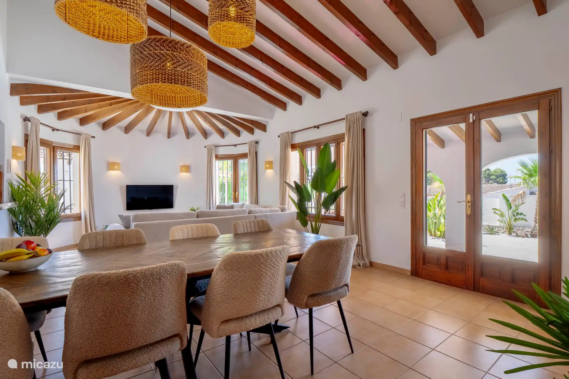 Attractive dining room with natural materials and lots of light.