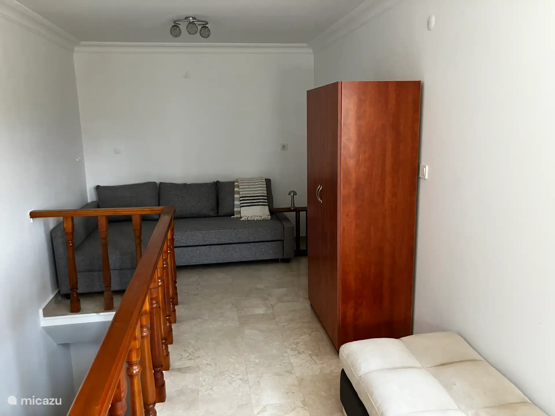 Here is a spacious double sofa bed and large wardrobe.
Air conditioning here too.