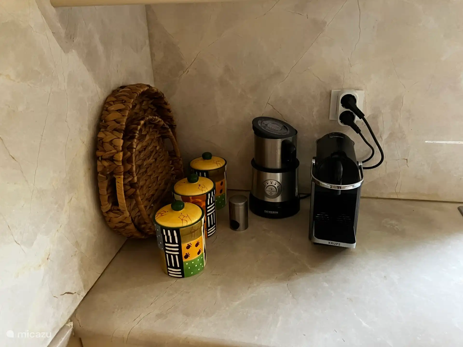 Nespresso with milk frother for a delicious morning cappuccino.