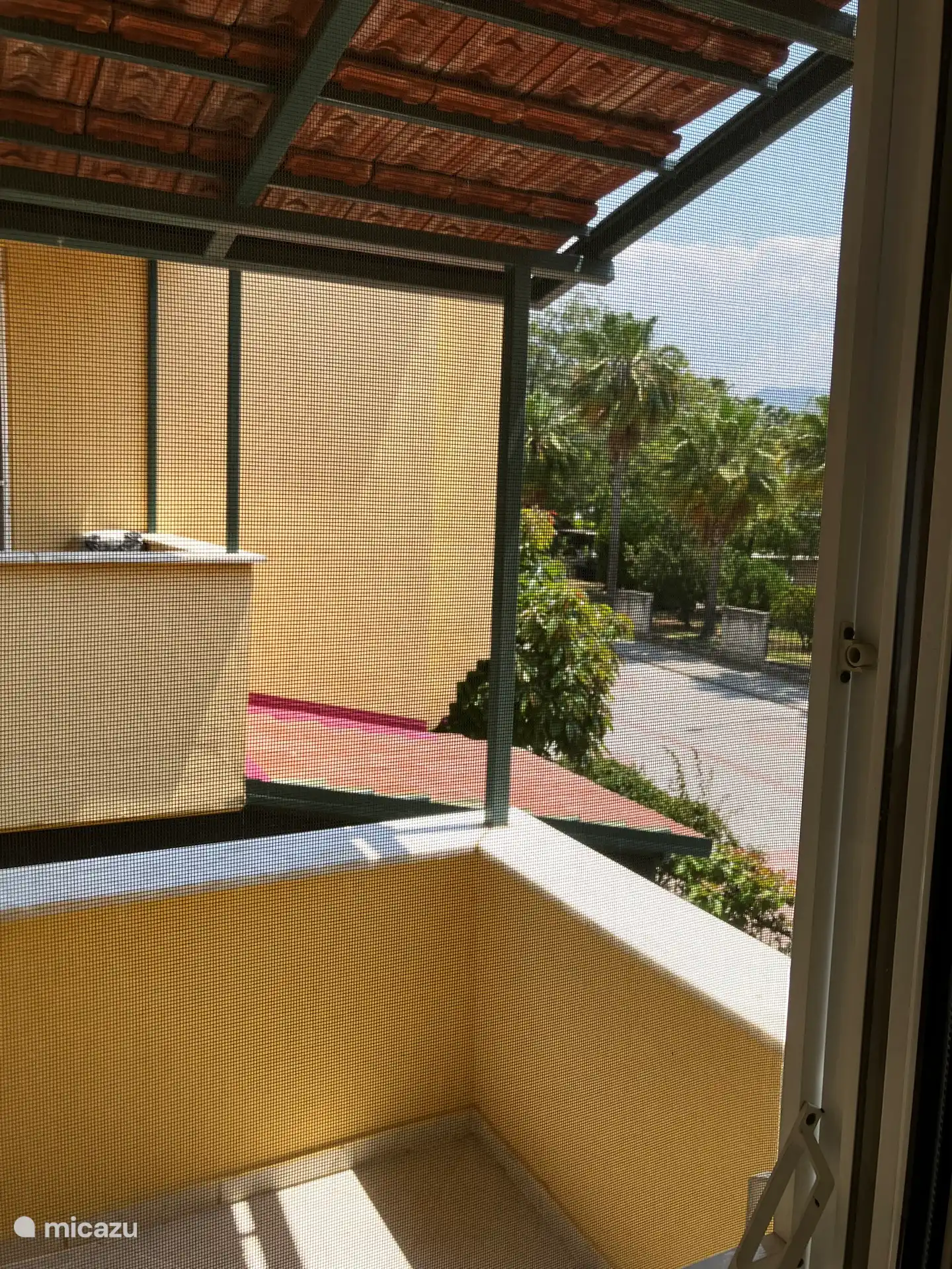 The small terrace with a view of the university and the mountains.