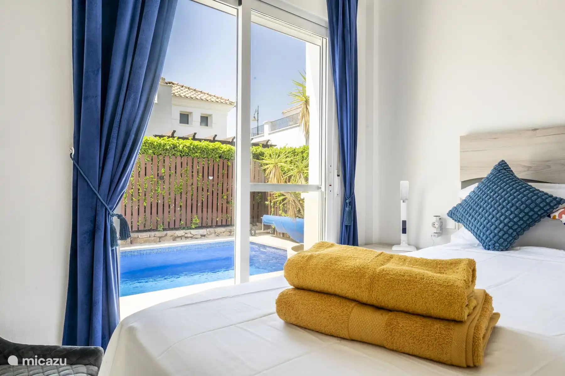 Master bedroom - window view of the pool