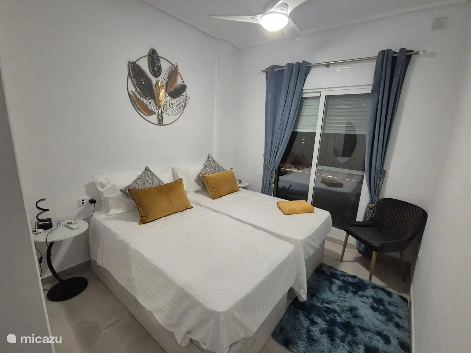 Bedroom 2 - 2 single beds that can be used as a double bed with a zip zipper.