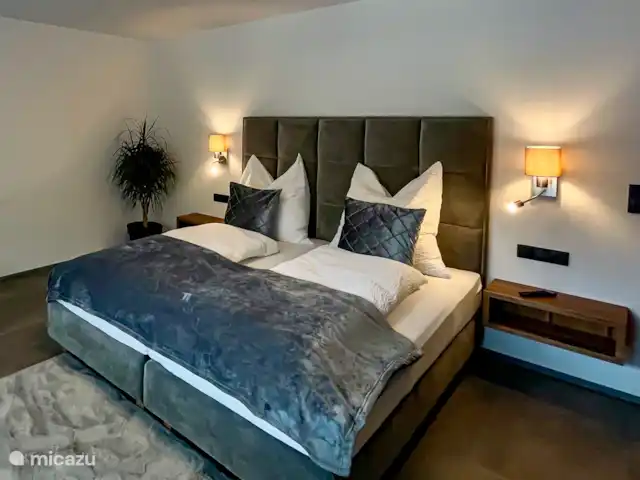 Location de Vacances Autriche, Tyrol, Gerlos, appartement - Appartement avec terrasse Chambre avec lit double et canapé-lit pour 2 personnes