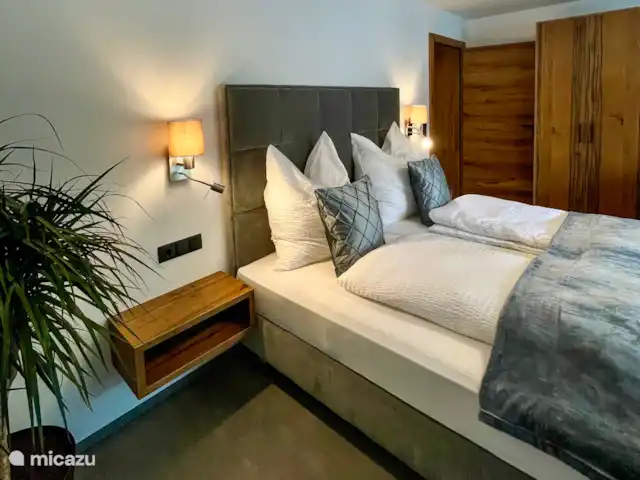 Location de Vacances Autriche, Tyrol, Gerlos, appartement - Appartement avec terrasse Chambre avec lit double et canapé-lit pour 2 personnes