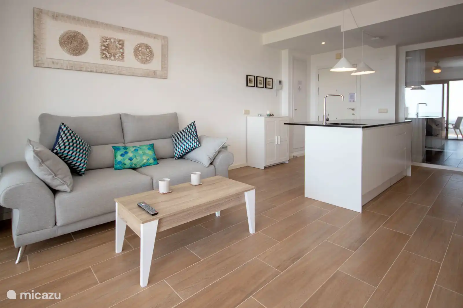 Sala de estar y cocina abierta