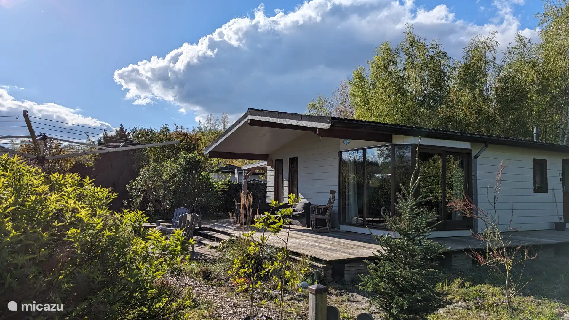 Le chalet avec véranda en bois