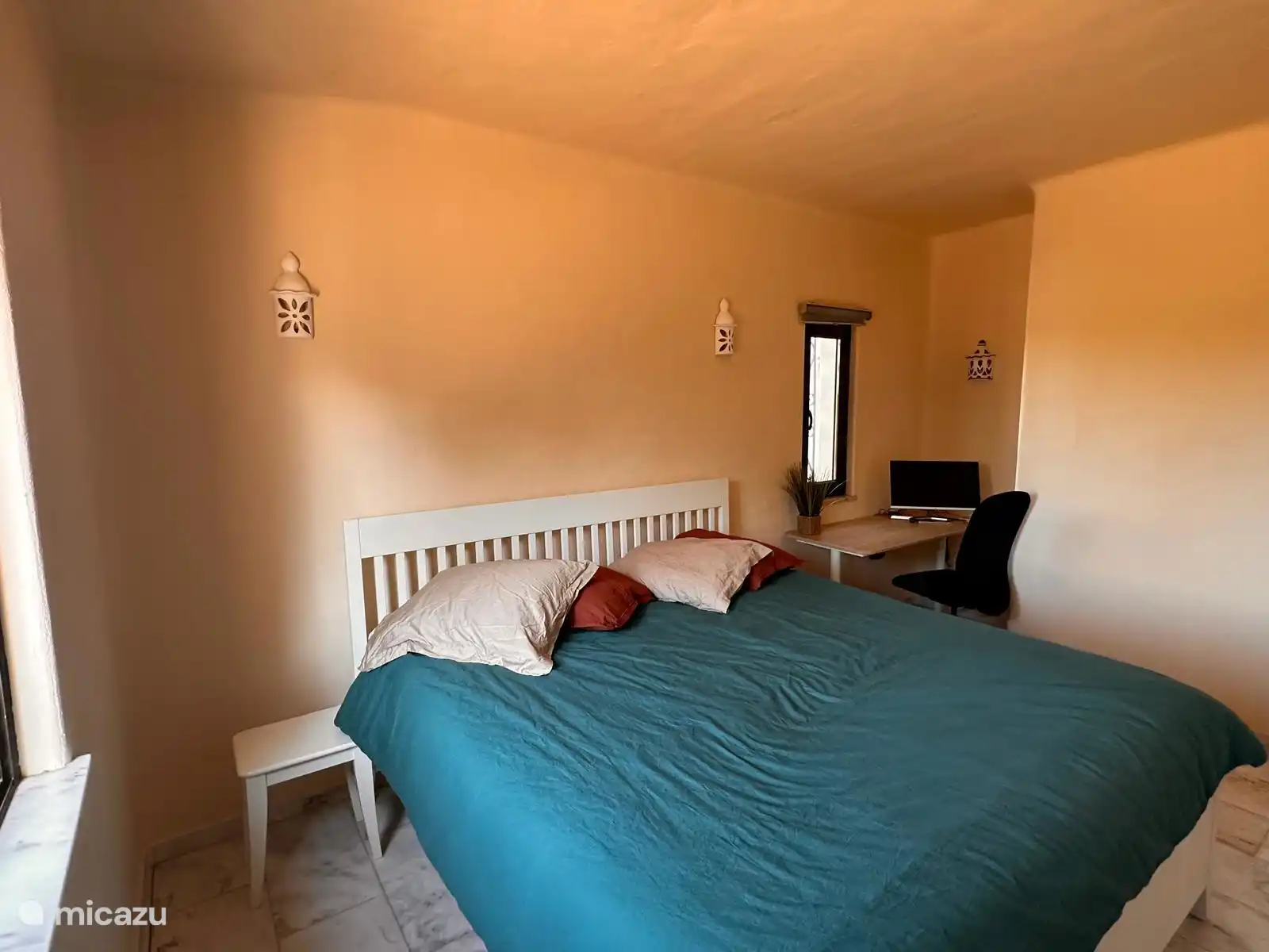 large downstairs bedroom with bathroom