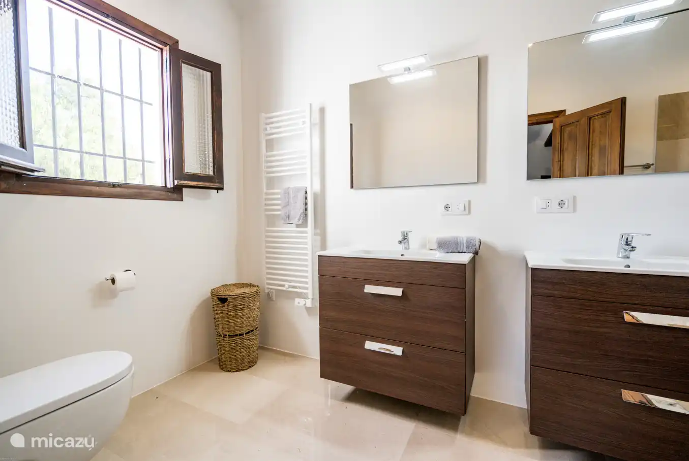The bathrooms are all equipped with sinks, walk-in shower and toilet.