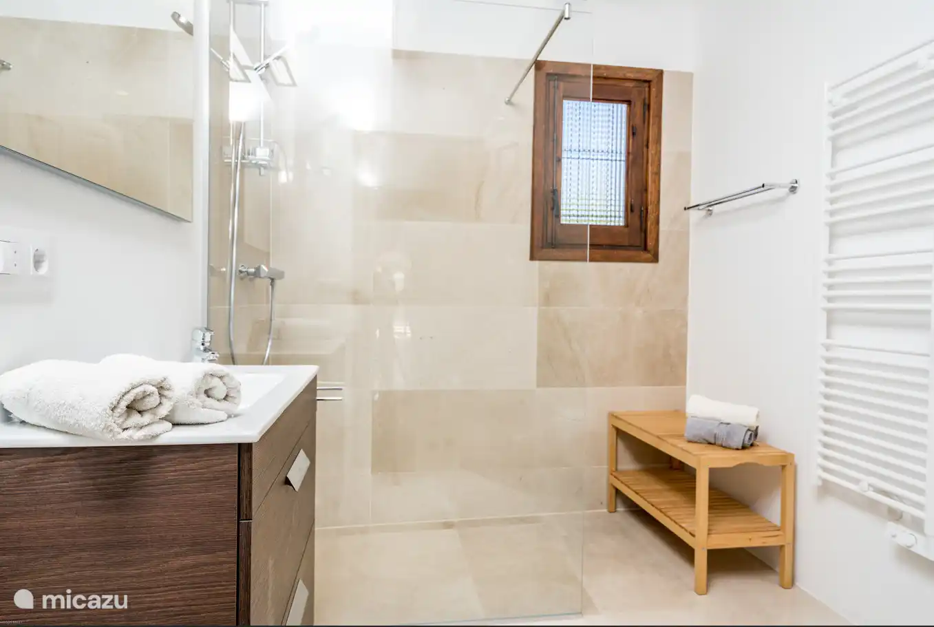 The bathrooms are all equipped with sinks, walk-in shower and toilet.