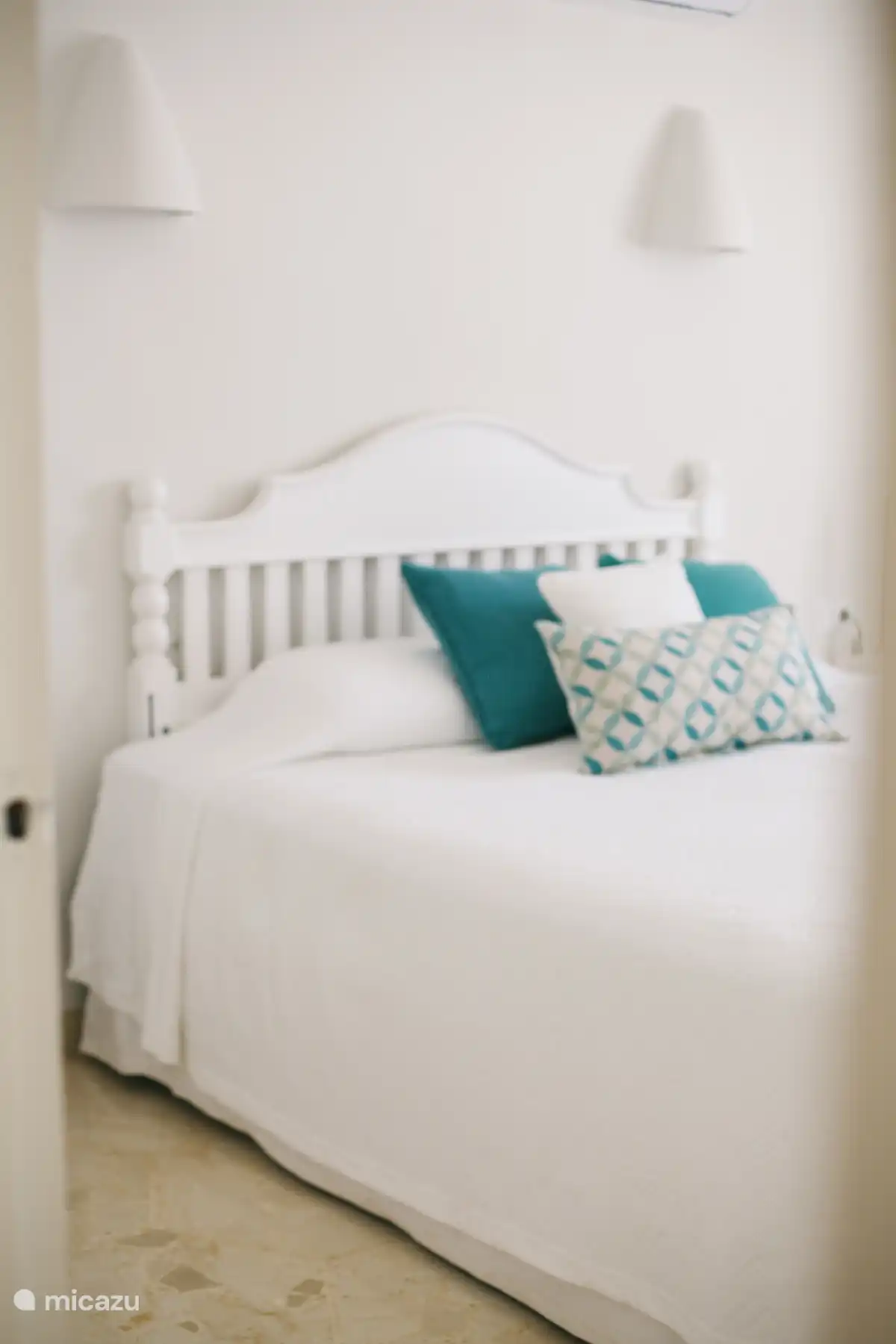 Two bedrooms have a double bed and two have two single beds.