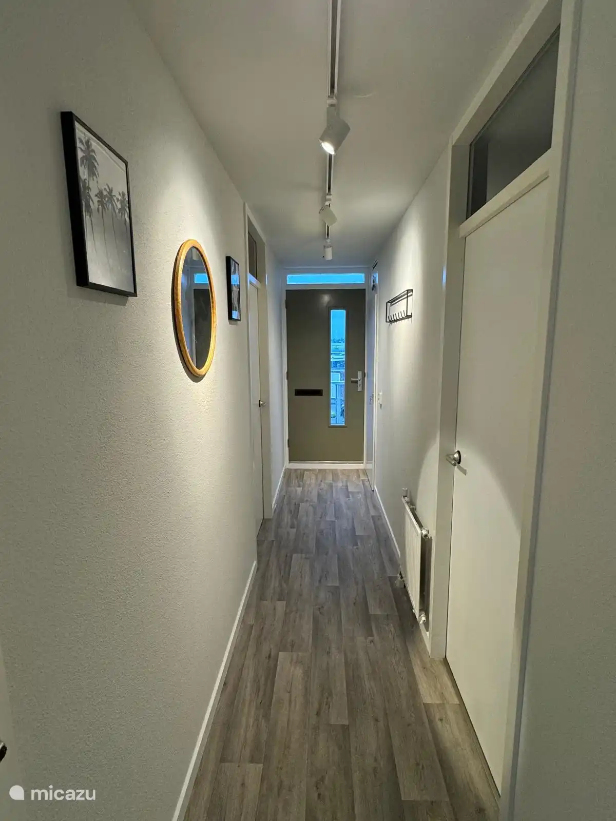 De hal waar je binnenkomt. 