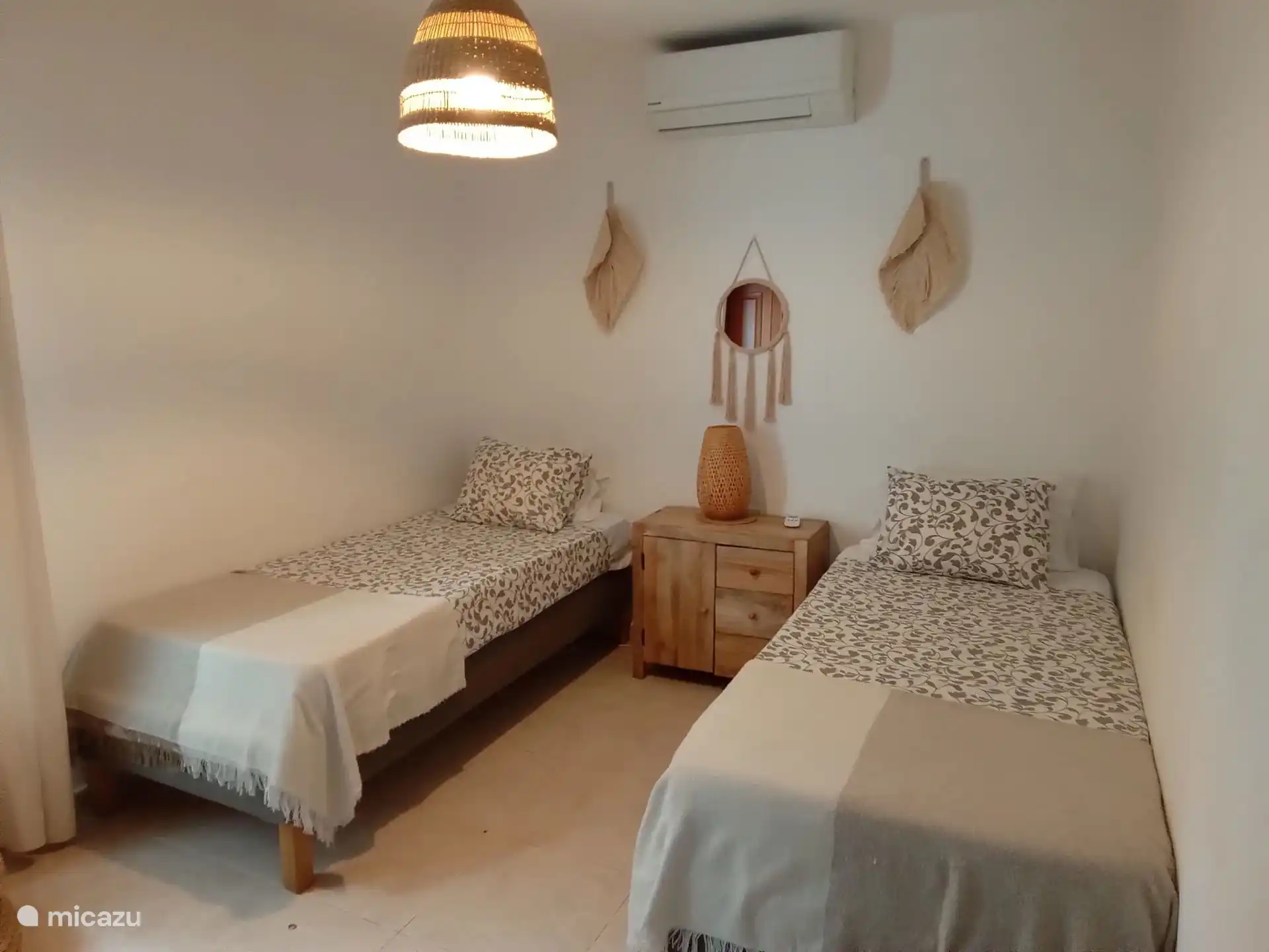 The second bedroom has 2 single beds and also a fitted wardrobe.