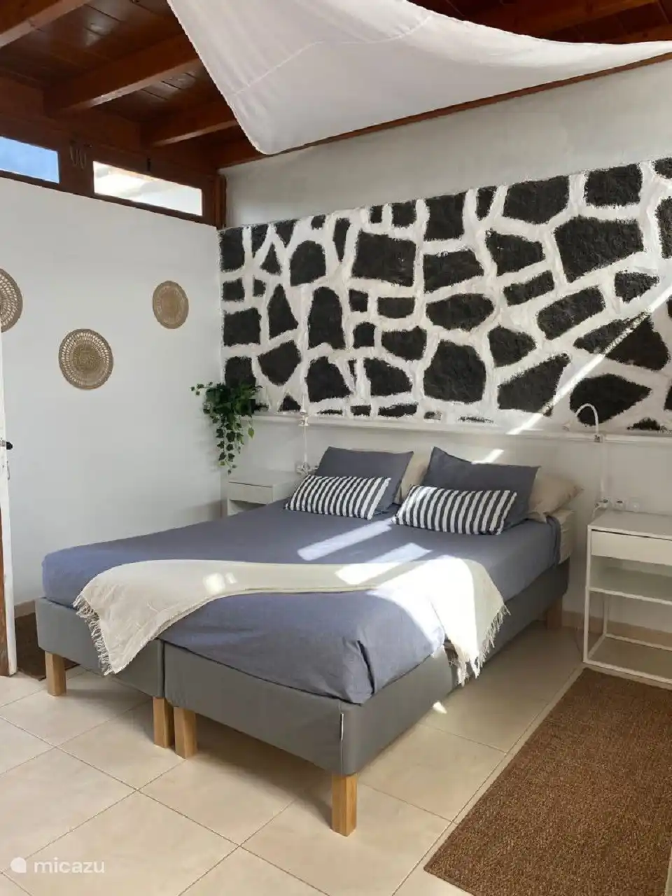 Access to the first bedroom is also via the conservatory. This bedroom has a double bed, a large built-in wardrobe.