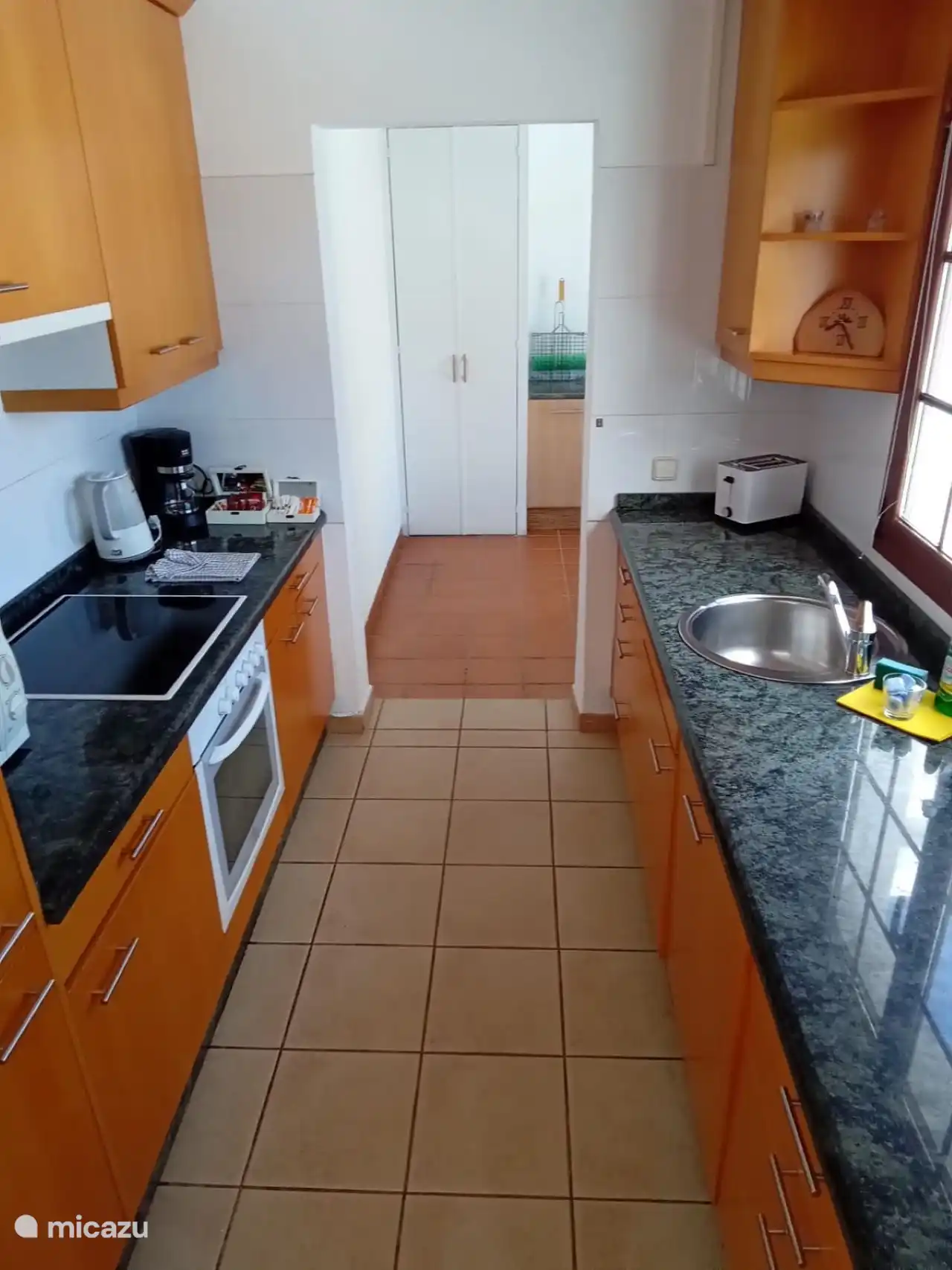 The kitchen is equipped with all conveniences such as a dishwasher, refrigerator, freezer, oven, kettle, coffee maker and toaster. 