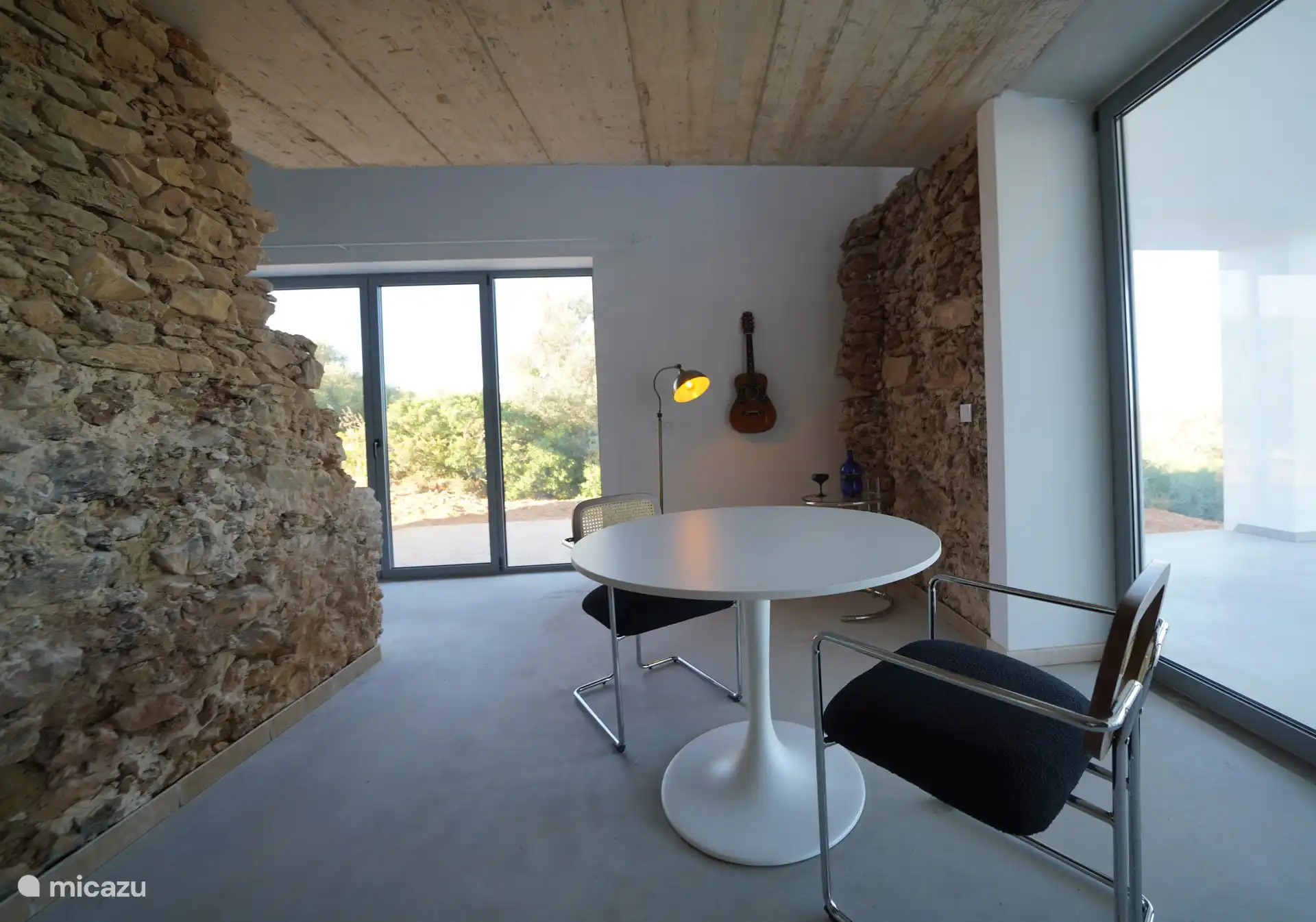 The dining table adjacent to the west terrace