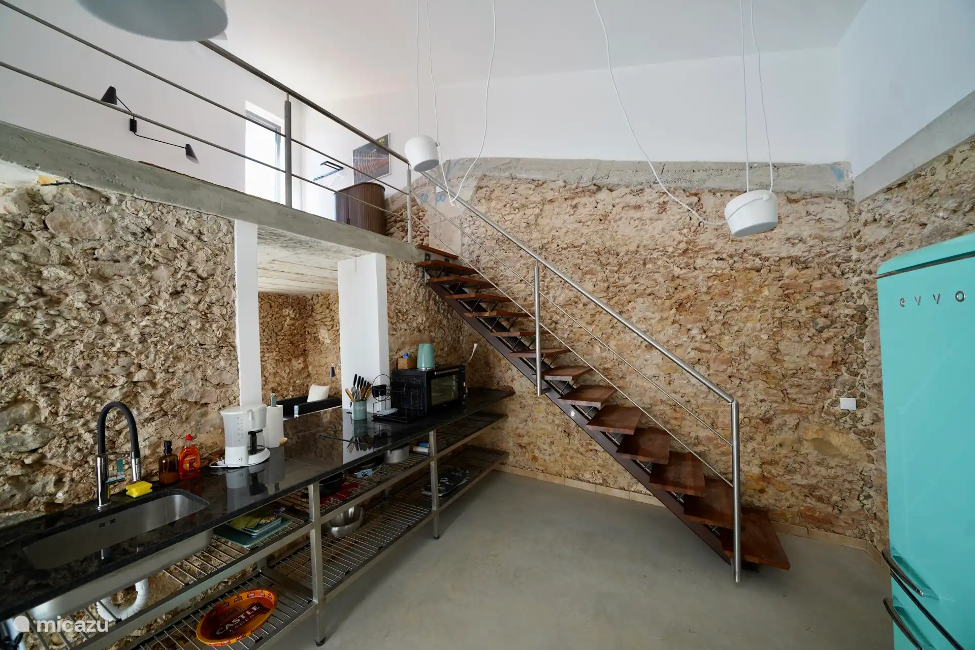 The kitchen with stairs 