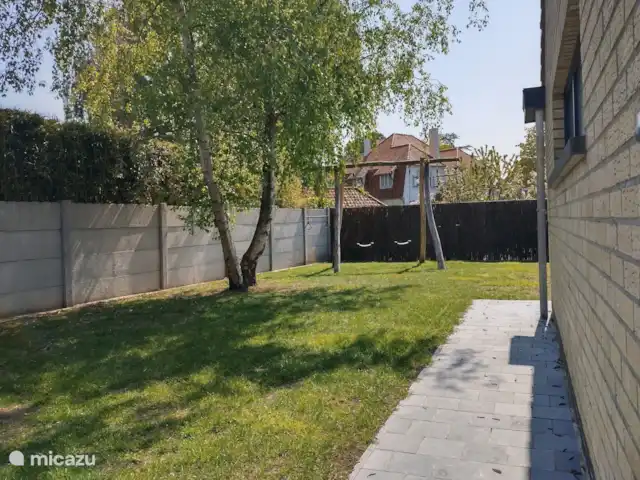 Location de Vacances Belgique, Côte Belge, Koksijde, maison de vacances - Maison Congé Jardin avec vue sur la balançoire
