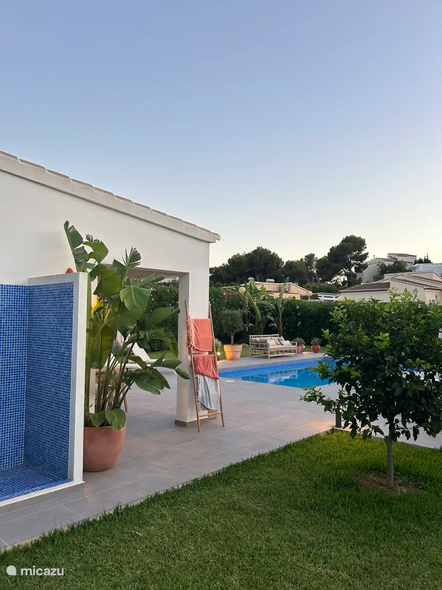 Terrace with outside shower, barbecue and dining area and the private swimming pool. 