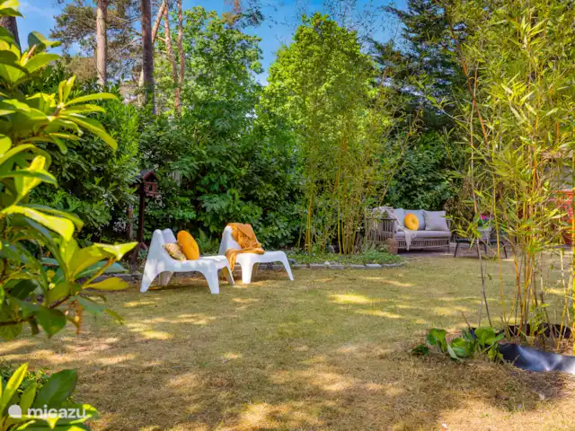 Cabaña Woodsy Forest en Países Bajos, Limburgo, Sevenum - chalet Hay varias zonas de estar disponibles en el jardín