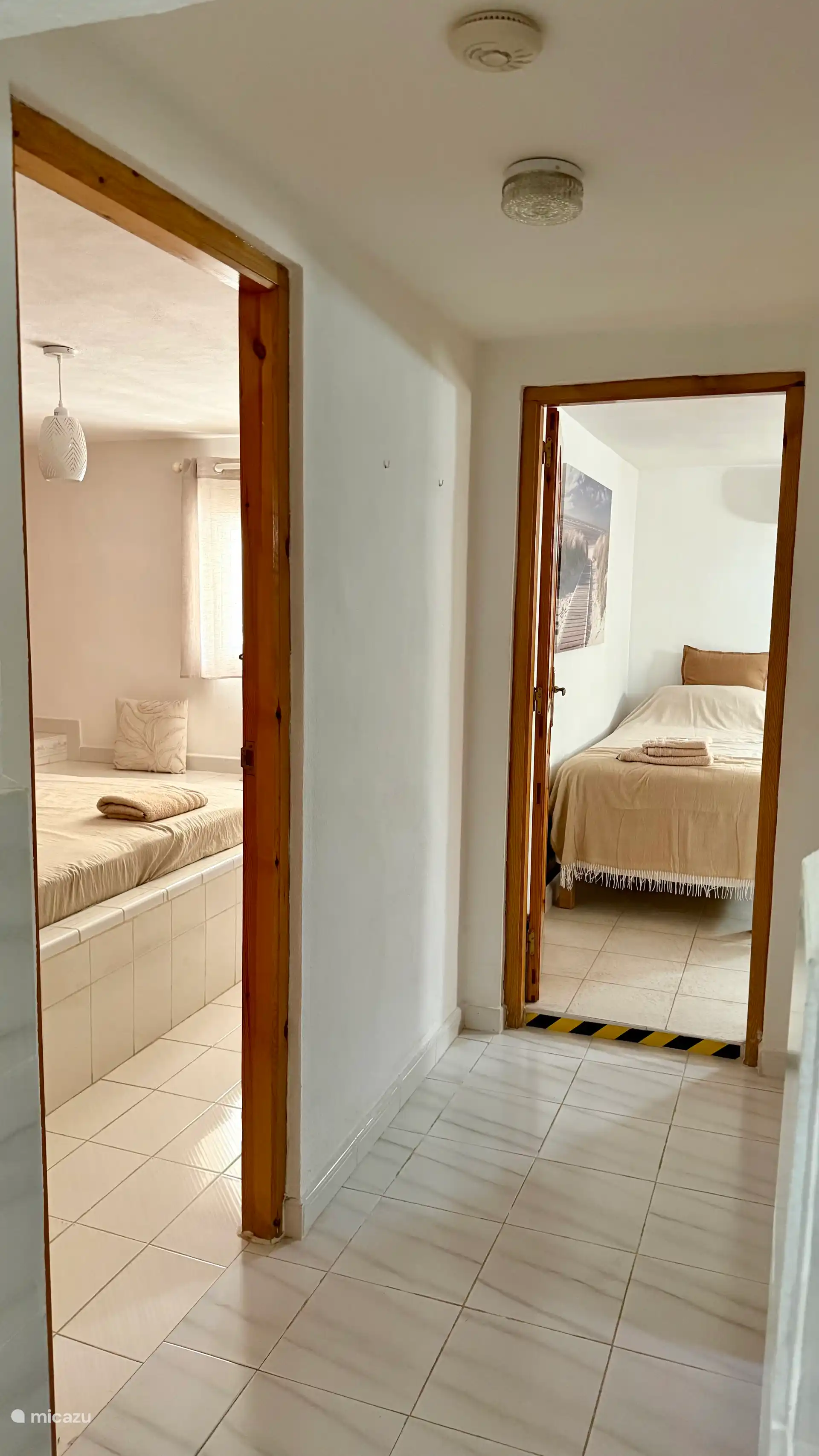 Hallway to bedrooms and bathroom