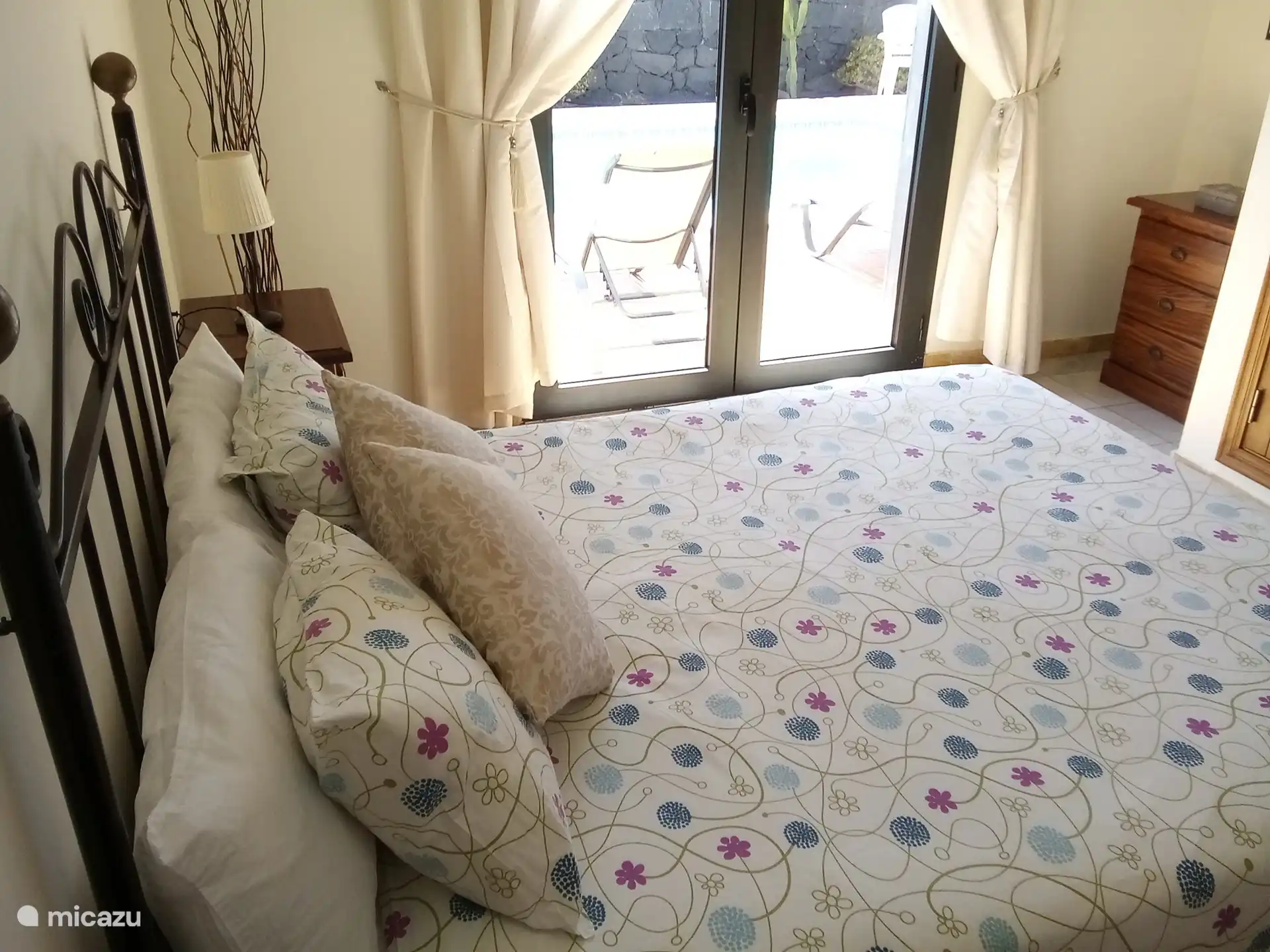 There are two bedrooms. Bedroom 1 has a double bed, air conditioning and an en-suite bathroom.