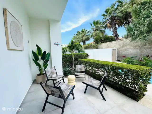 Location de Vacances Curaçao, Banda Ariba (est), Bapor Kibra, appartement - Oasis Lumora Siège à l’arrière de la piscine