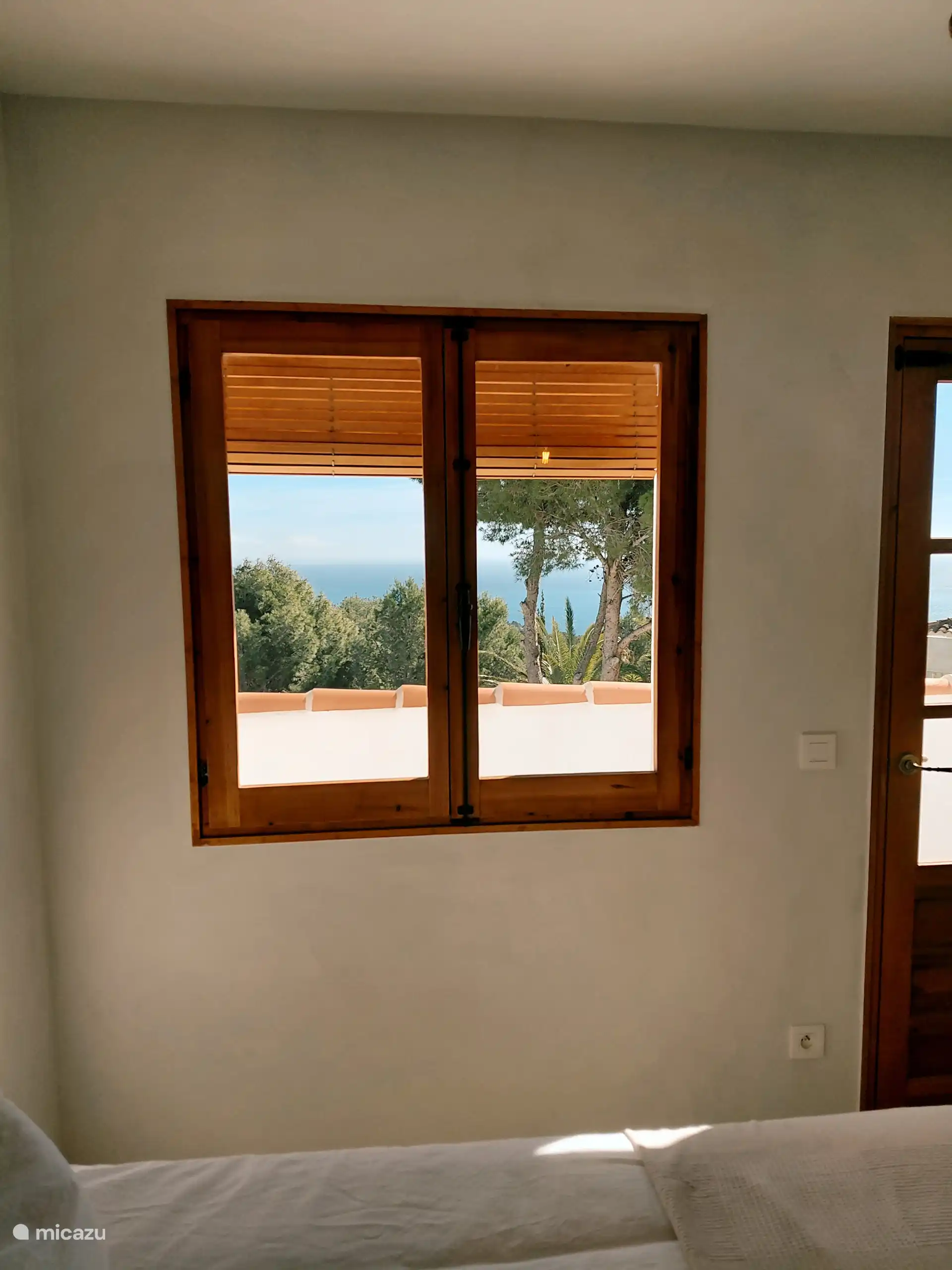 Uitzicht slaapkamer studio