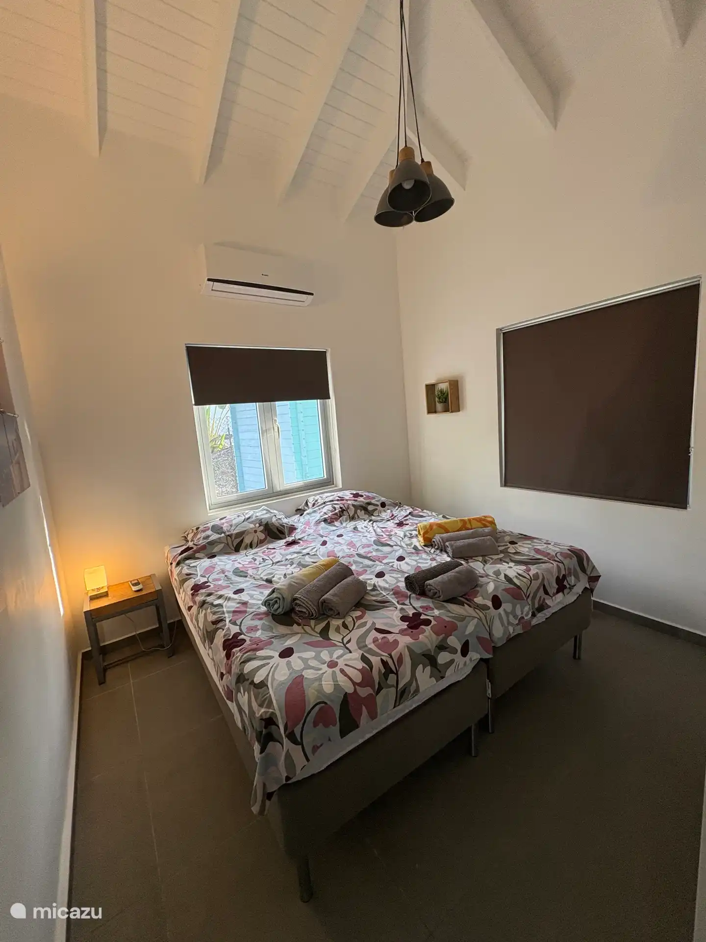 De twee eenpersoonsbedden kunnen naast elkaar of apart worden geplaatst