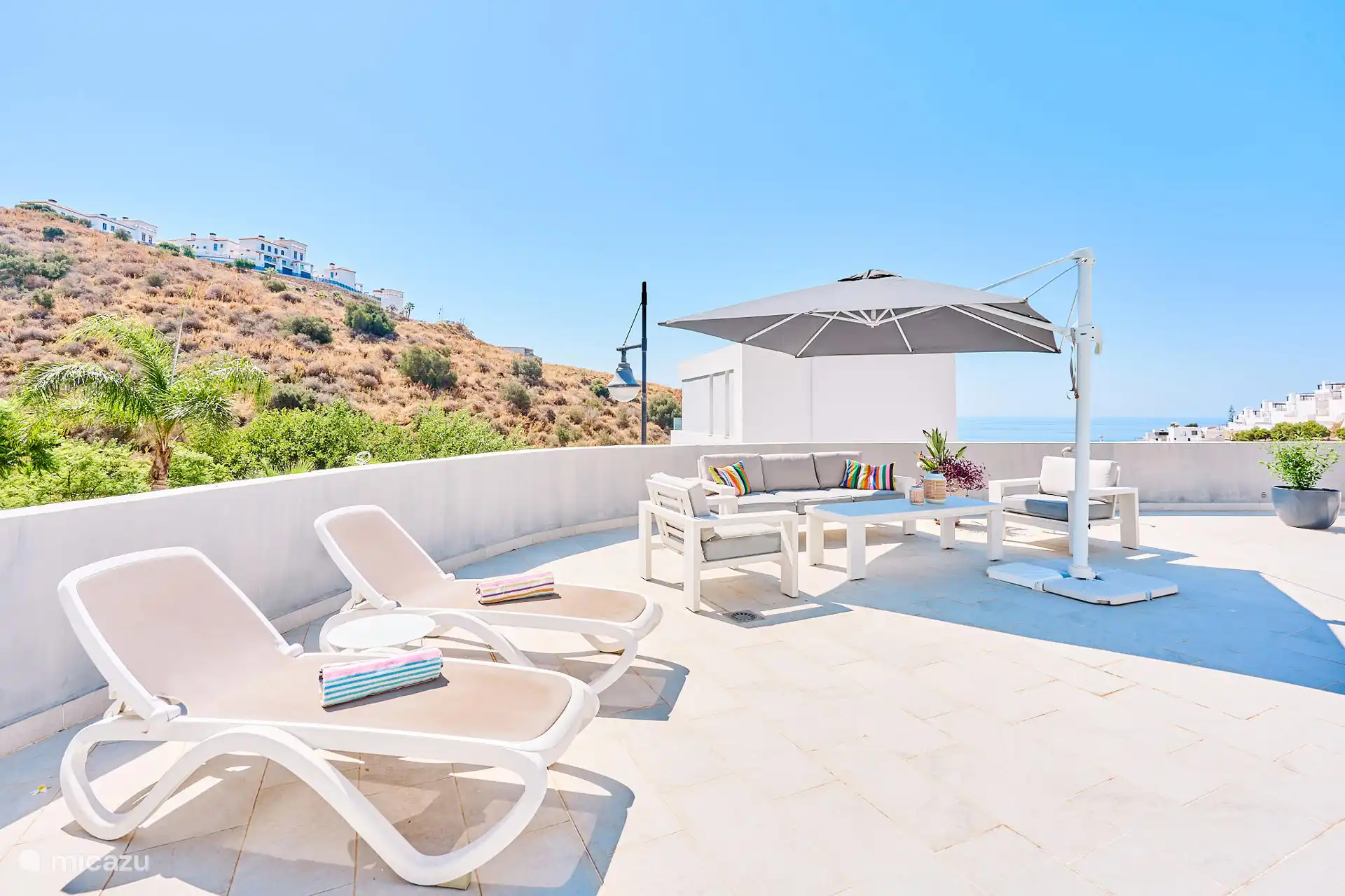 terrace with cozy sitting area