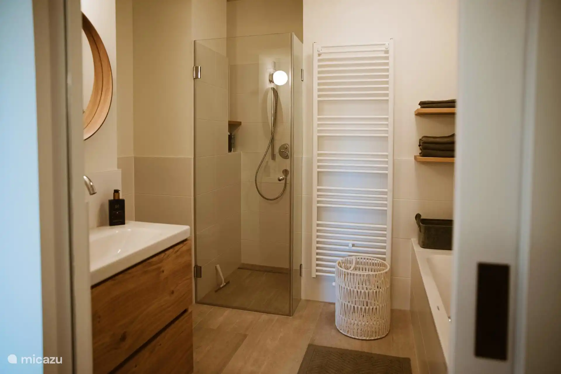 Second bathroom with toilet, shower and bath