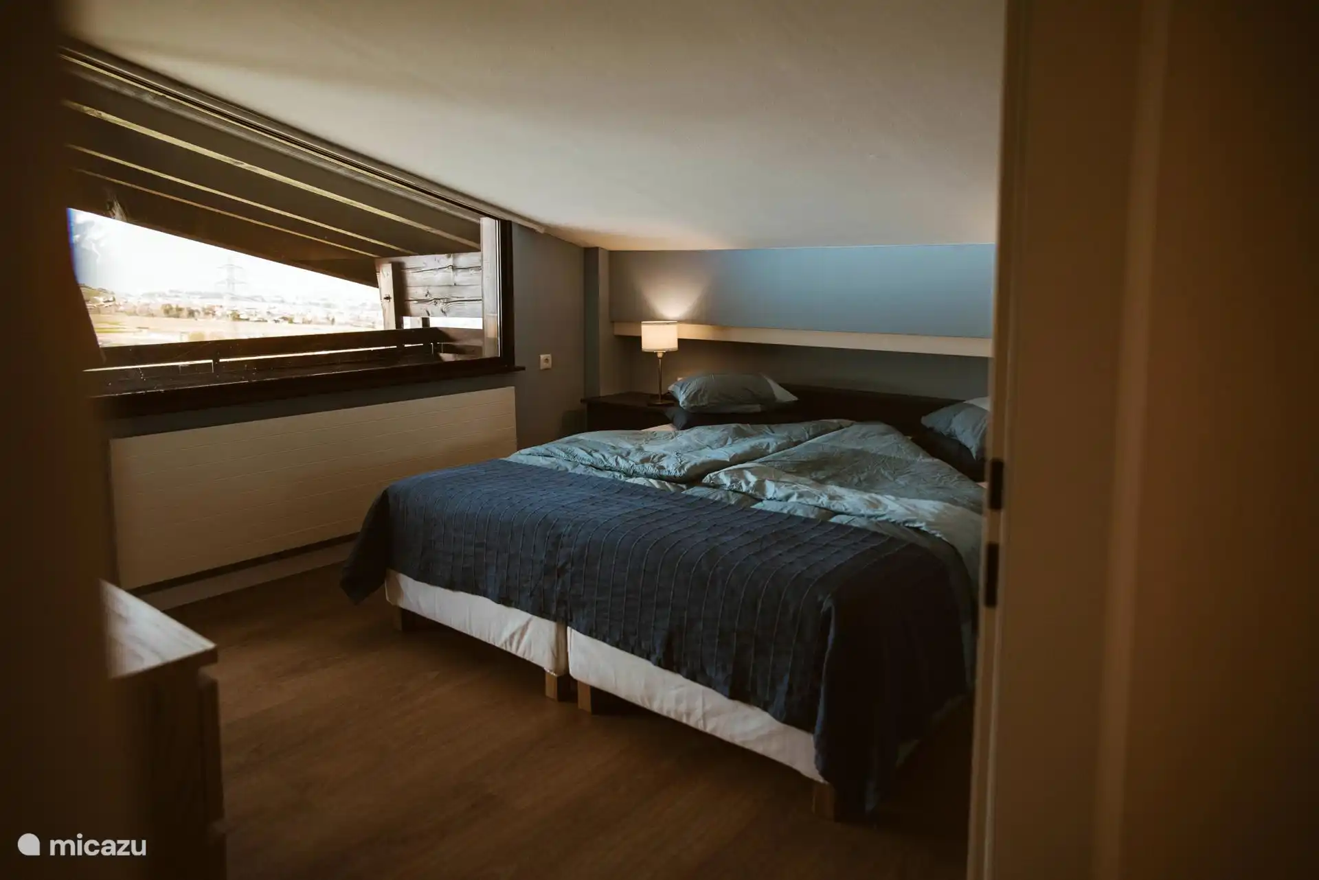 Spacious bedroom with balcony