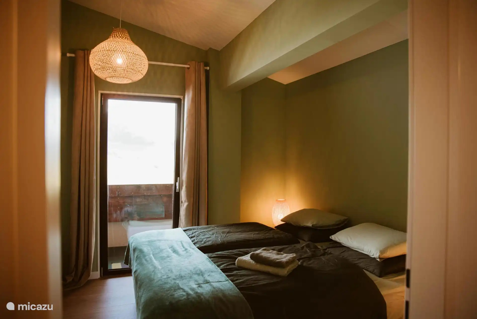 Spacious bedroom with balcony