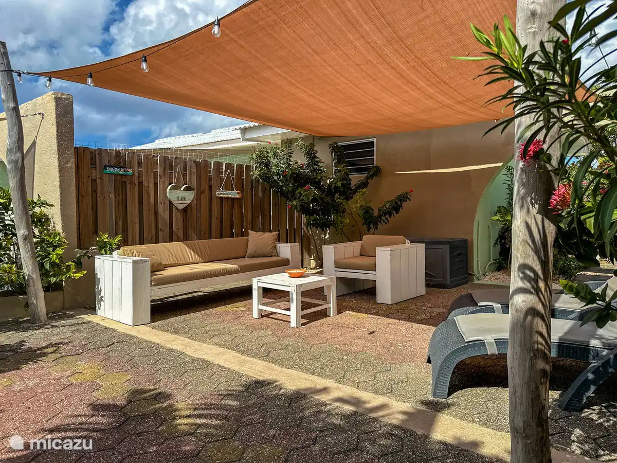 First terrace with lounge area and sunbeds