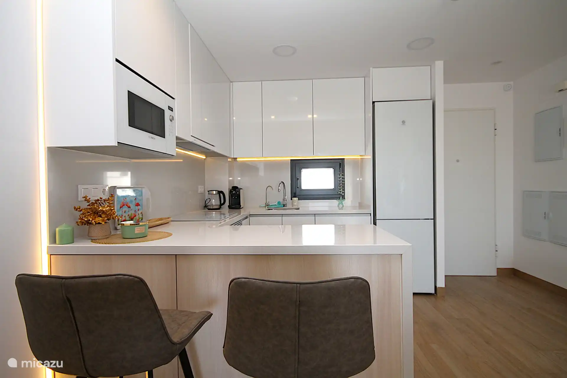 Gemütliche Frühstücksbar in der Küche.