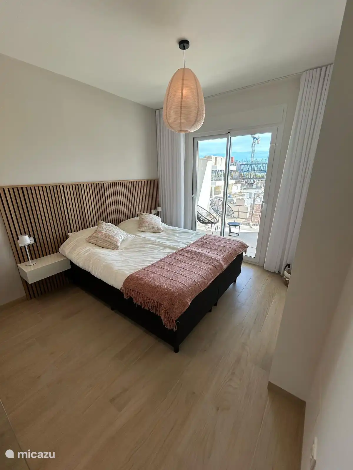 Bedroom with double bed of 160x200. 
Large built-in wardrobe with safe for valuables. 