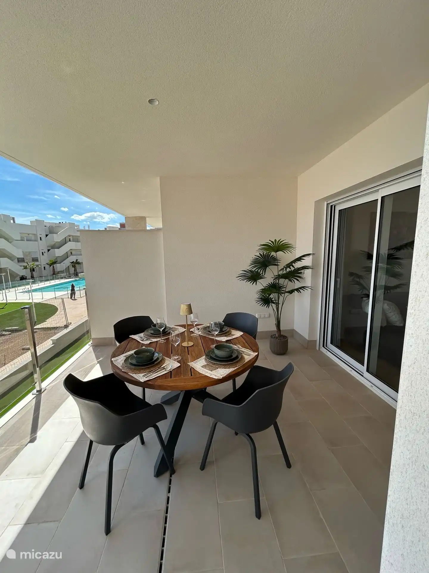 Large balcony with round table and 4 bucket seats. 
Also a 2nd lounge set available. 
You can sit in the sun and in the shade. 