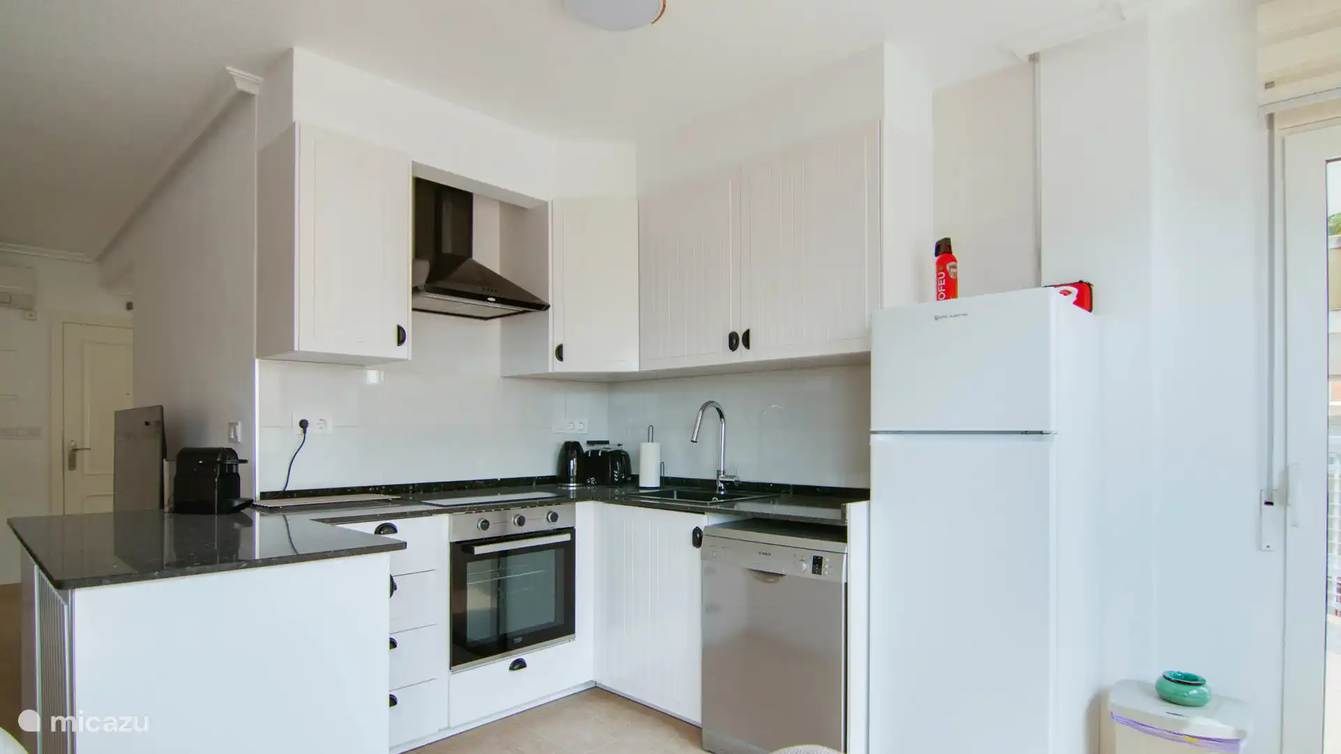 Fully equipped kitchen with all necessary appliances.