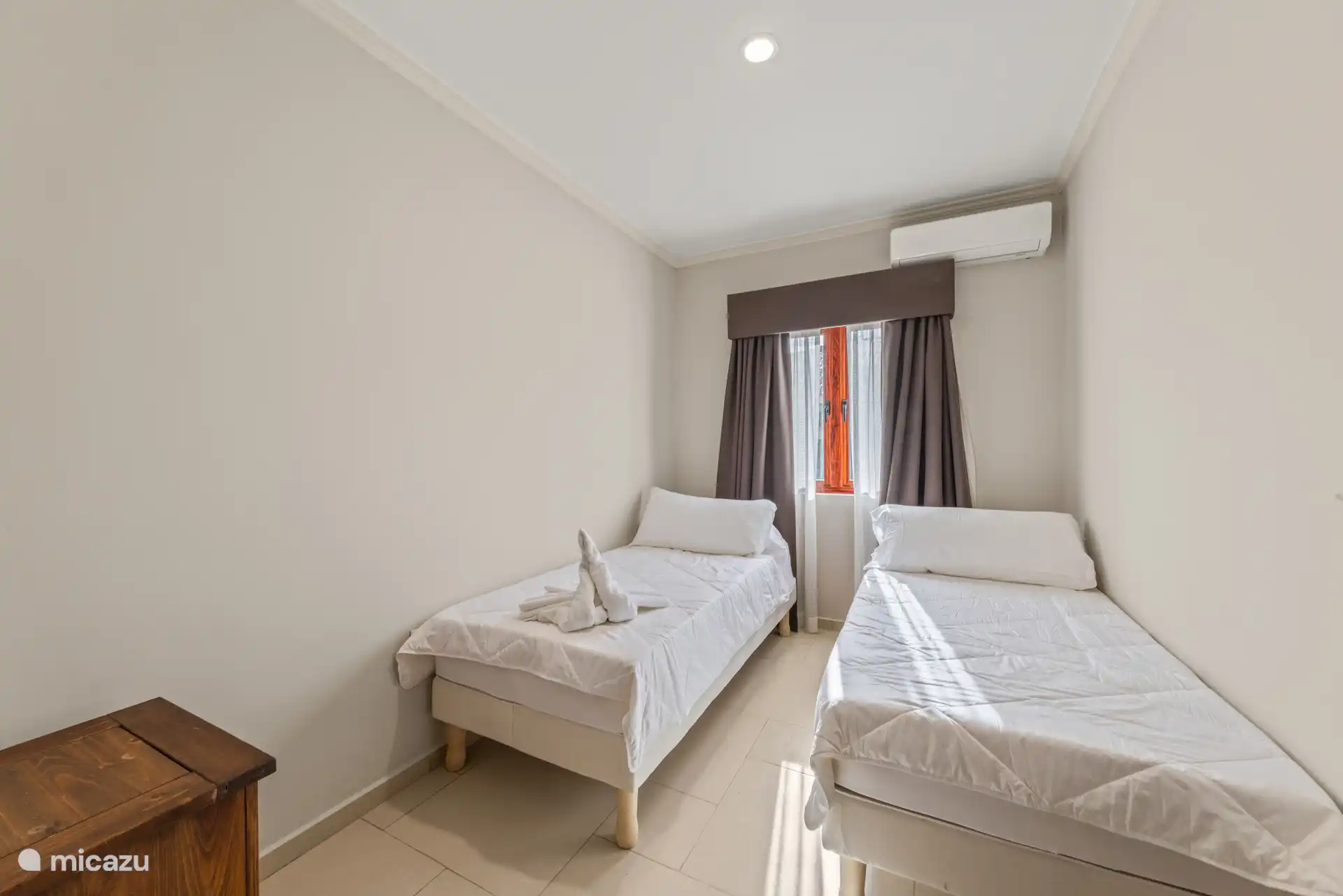 Practically furnished and comfortable, this room will soon get a nice upgrade.