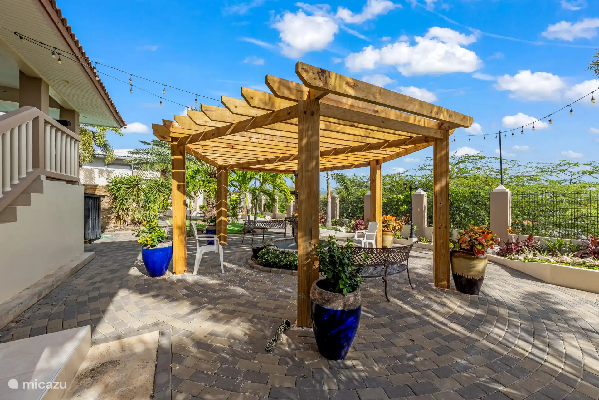 Escape to a garden full of palms, flowers and pure relaxation at Villa Sophia